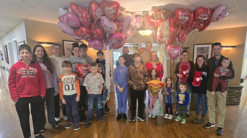 Youth and Knights bring flowers to Soddy Daisy Healthcare Center